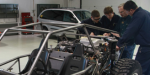 Image of students working on the hybrid dune buggy