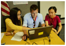 Students working on a computer together