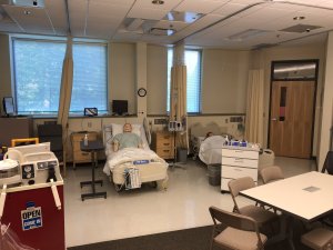 nursing simulation room, manikin and equipment, ready for students