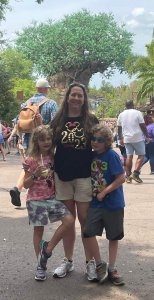 Cathy with kids in Animal Kingdom