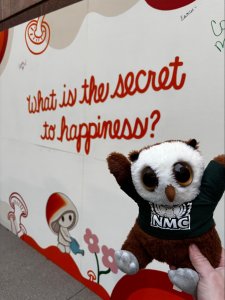 Swoop at a sign "What is the secret to happiness"?